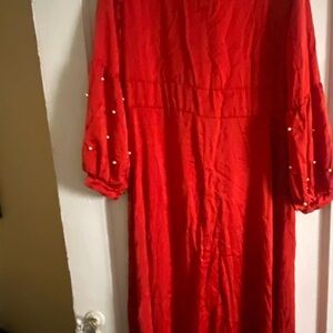 Red dress long pearls on the sleeve for a tall person